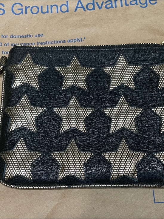 Juicy Couture Handbags - Juicy Couture Black 100% Goat Leather Wristlet with Metallic Stars EUC
